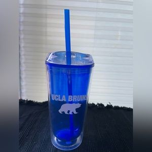UCLA reusable plastic water bottle container with straw.